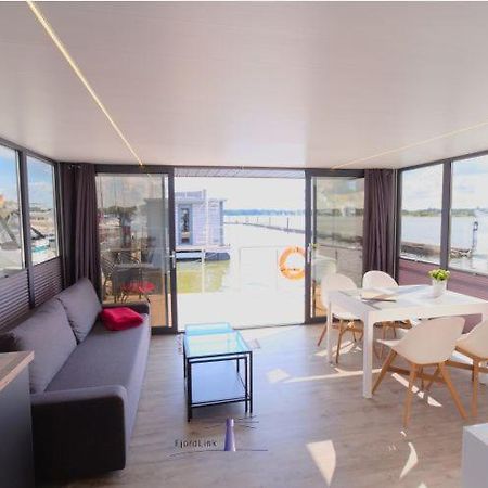 Hausboot Fjord Aries Mit Dachterrasse In Schleswig Hotel Bagian luar foto
