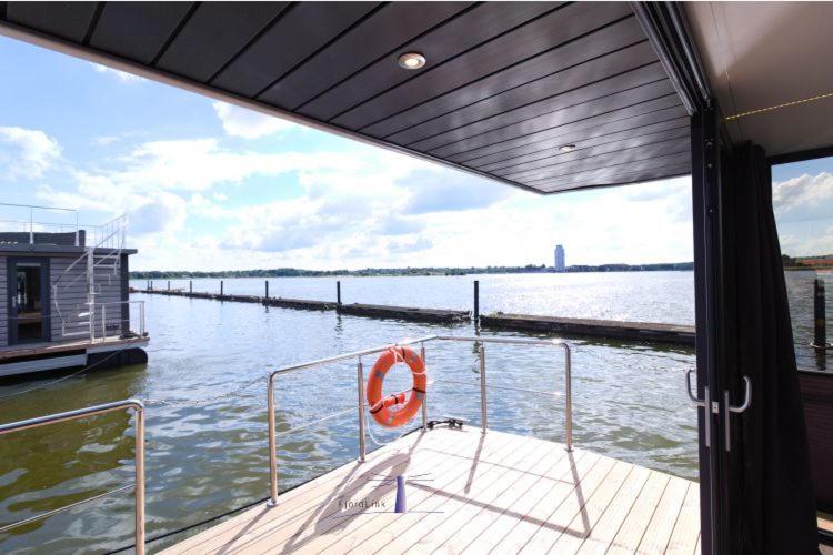 Hausboot Fjord Aries Mit Dachterrasse In Schleswig Hotel Bagian luar foto